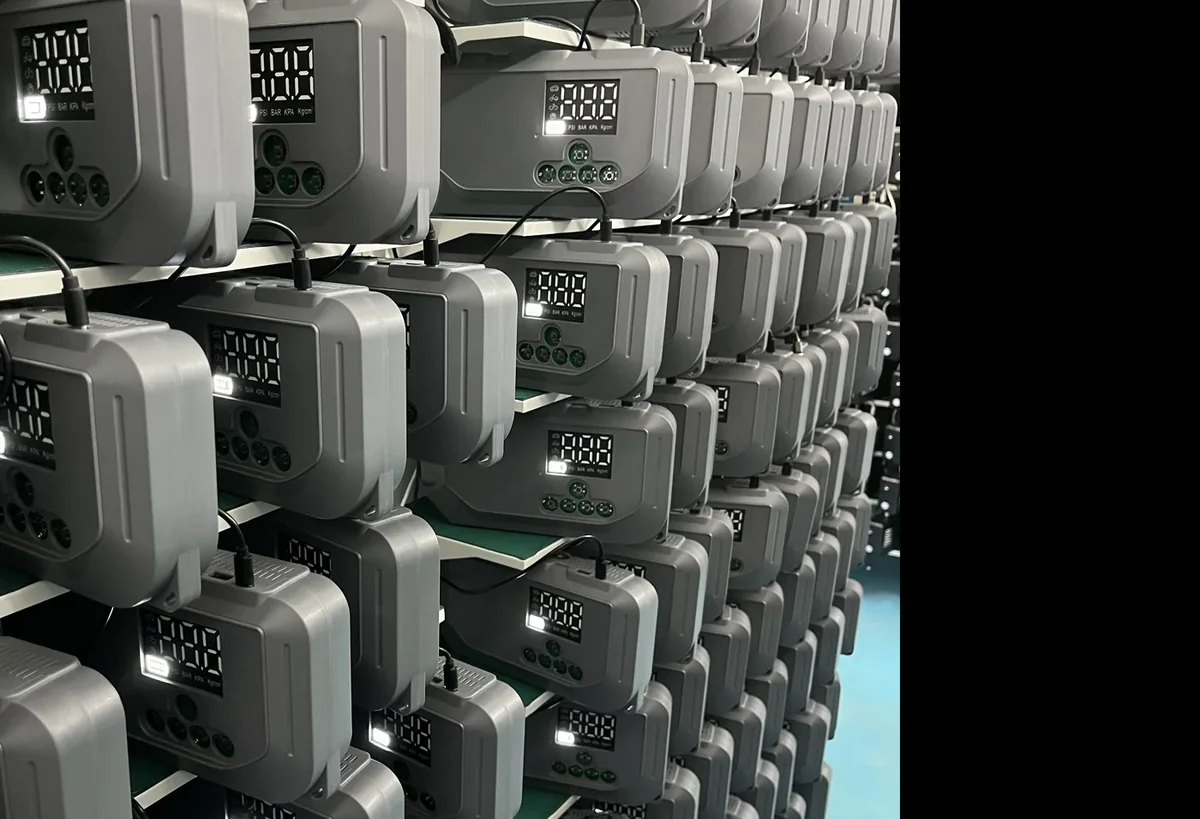 Car Jump Starter units undergoing batch inspection